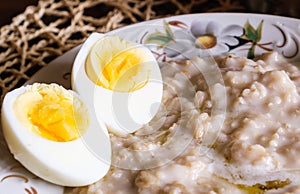 Morning breakfast kitchen fresh natural food oatmeal and boiled egg