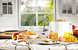 Morning breakfast. Kitchen table background with kitchen tools. Space for your decoration or advertising product.