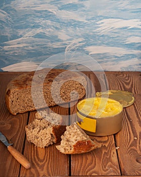 Morning breakfast in a rustic kitchen with homemade bread and ghee