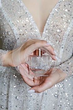 Morning bride perfume in hands