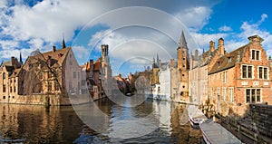 Morning Bruges, Belgium. Panoramic Image In Realistic Color with Rozenhoedkaai in Brugge,Dijver river canal with Belfort / Belfry