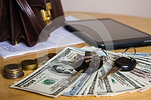 Morning businessmen and business concept, car keys, money, coins, purse, tablet