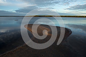 Morning calm river and the sand alluvium.