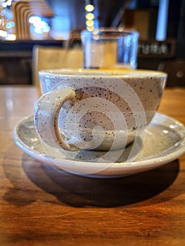 Morning Capucino cup on a table
