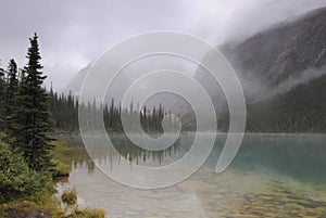 Morning cloud over Cavell Lake in Canadian Rockies