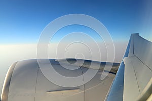 Morning cloudy sunrise with Wing of an airplane. picture for add text message or frame website. Traveling concept