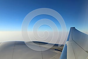 Morning cloudy sunrise with Wing of an airplane. picture for add text message or frame website. Traveling concept