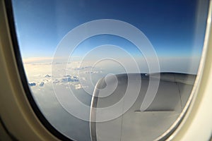 Morning cloudy sunrise with Wing of an airplane. picture for add text message or frame website. Traveling concept