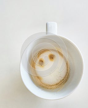 Morning coffe cup with smilling face