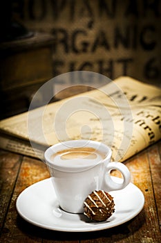 Morning coffee break with newspaper photo