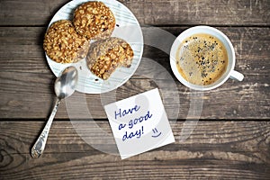 Morning coffee with cookies on a wooden table