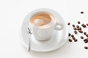 Morning coffee latte cup beans white background