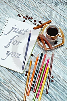 Morning coffee and text in notepad: Just for you