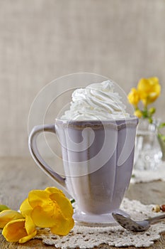 Morning coffee with whipped cream flowers