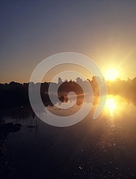 morning fishing on the river with sunrise