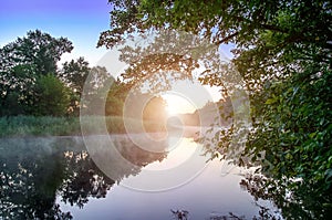 Morning fog on calm river