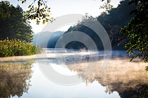 Morning fog on a calm river