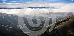 Morning fog covering the hills and valleys at the foothills of Mt Diablo State Park