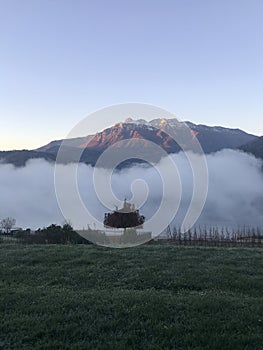 Morning fog over Lake Caldonazzo in Trentino, Northern Italy