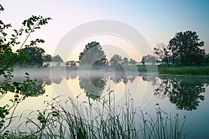 Morning fog on a quiet lake