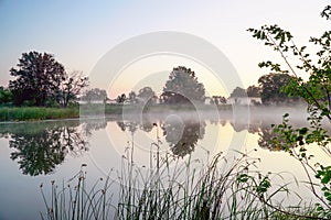 Morning fog on a quiet lake