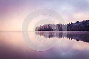 Morning fog and reflections on the lake