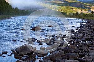 Morning fog on river in northern Mongolia