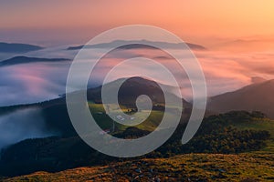 Morning fog in the valley from Oiz mountain photo