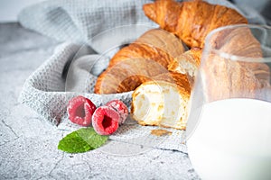 Morning with fresh croissants. Backgrounds on concrete.