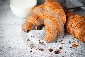 Morning with fresh croissants. Backgrounds on concrete.