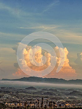 The morning  from a height with views of the sea of clouds. in Temanggung, Central Java, Indonesia