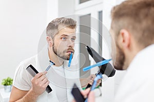 Morning hygiene, Man in the bathroom and his morning routine