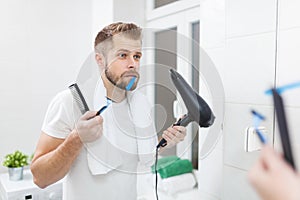 Morning hygiene, Man in the bathroom and his morning routine