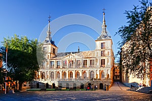 Morning ight at Plaza del Ayuntamiento in front of the Cathedral of Saint Mary in Toledo, Spain photo