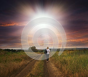 Morning jogging running silhouette of a girl on the background of a beautiful sunrise