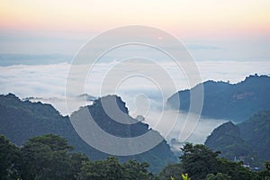 Morning landscape with warm light and mist