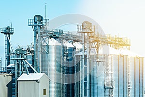 Morning light on grain storage silos