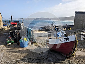 A fishing boat in Sennen Cove, Cornwall, England photo