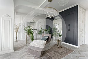 Morning in luxurious light interior in hotel. Bright and clean interior design of a luxury living room with parquet wood