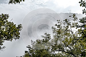 The morning mist covers the landscape