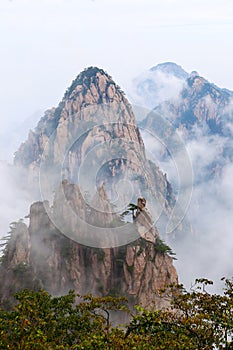 Morning mist over the beautiful mountains Huangshan