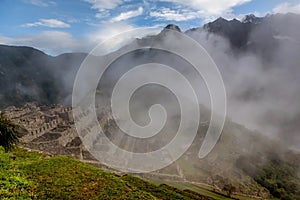 Morning mist rising above Macchu Picchu Valley, Peru