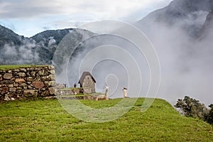 Morning mist rising above Macchu Pichu Valley, Peru