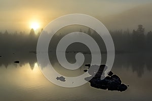 Morning mist on the river Zhombolok