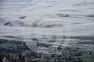 Morning mist view from Bachtel Tower with fog in Ruti, Tann and Bibikon at Zurich Oberland, Switzerland