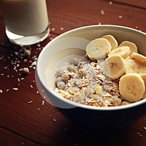 Morning oatmeal with nuts and almond milk. Vegan.