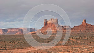 Morning panning view of saddleback mesa at monument valley in utah