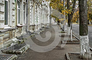 Morning perspective of the pedestrian part of the central street of Taganrog, during the autumn withering of nature