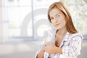 Morning portrait of attractive girl in pyjama