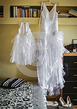 Morning preparations of bride`s dress before the wedding